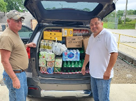 Charlie helping Carlos' ministry with a load of drinks and non-perishable food items Charlie helping Carlos' ministry with a load of drinks and non-perishable food items