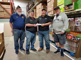 Don Hawkins & Davis Sassman accepting a donation from American Legion Commanders Don Hawkins & Davis Sassman accepting a donation from American Legion Commanders